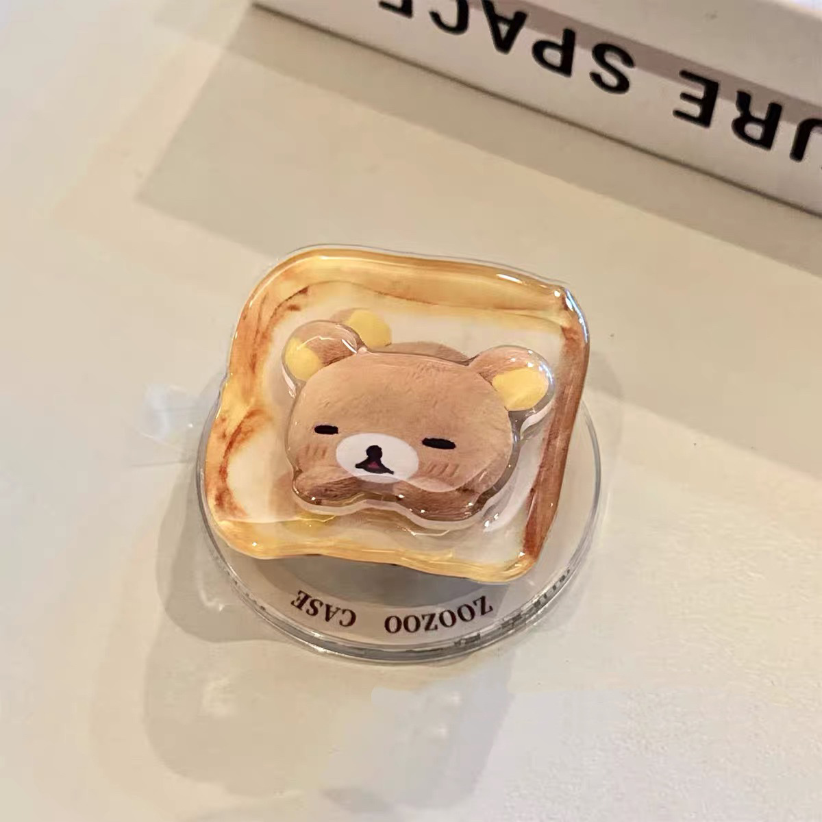 Màu sắc: Giá đỡ từ tính cho bánh mì nướng xoay Rilakkuma.